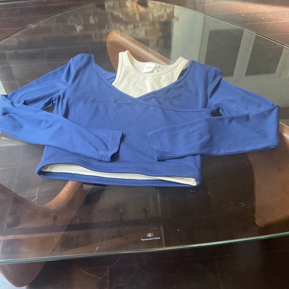 Lune active top .. worn once perfect condition build in tank ..light support